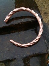 Load image into Gallery viewer, Hand forged twisted copper cuff bracelet with matching forged twisted copper earrings with sterling silver hooks
