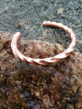 Load image into Gallery viewer, Hand forged twisted copper cuff bracelet with matching forged twisted copper earrings with sterling silver hooks