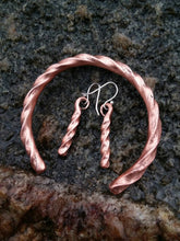 Load image into Gallery viewer, Hand forged twisted copper cuff bracelet with matching forged twisted copper earrings with sterling silver hooks