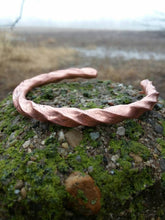Load image into Gallery viewer, Hand forged twisted copper cuff bracelet with matching forged twisted copper earrings with sterling silver hooks