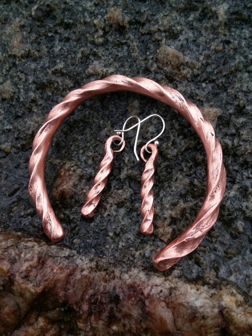 Hand forged twisted copper cuff bracelet with matching forged twisted copper earrings with sterling silver hooks