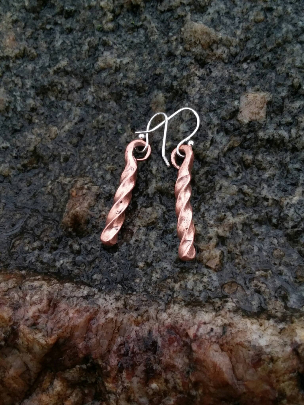 Hand forged twisted copper earrings with sterling silver hooks