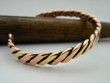 Load image into Gallery viewer, Hand forged twisted copper and brass wire cuff bracelet
